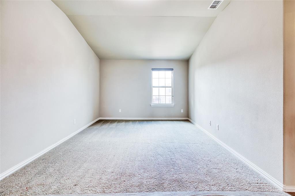 2317 Connor Way Carrollton, TX 75010 - Photo 30 of 37 an empty room with windows