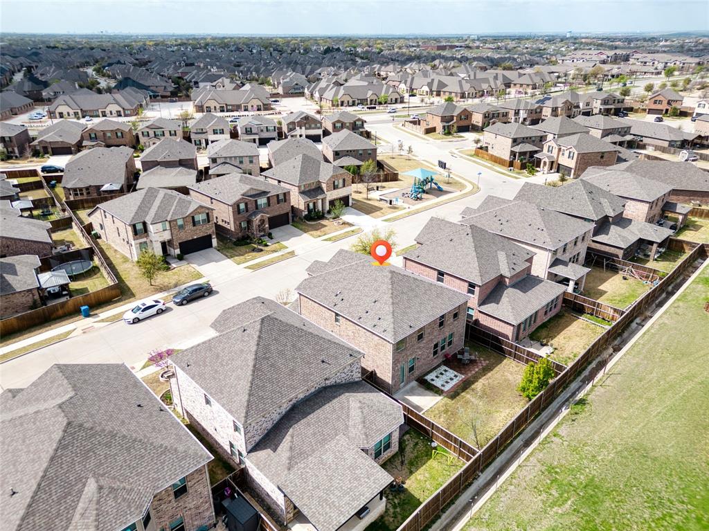 2317 Connor Way Carrollton, TX 75010 - Photo 5 of 37 an aerial view of a residential houses with outdoor space