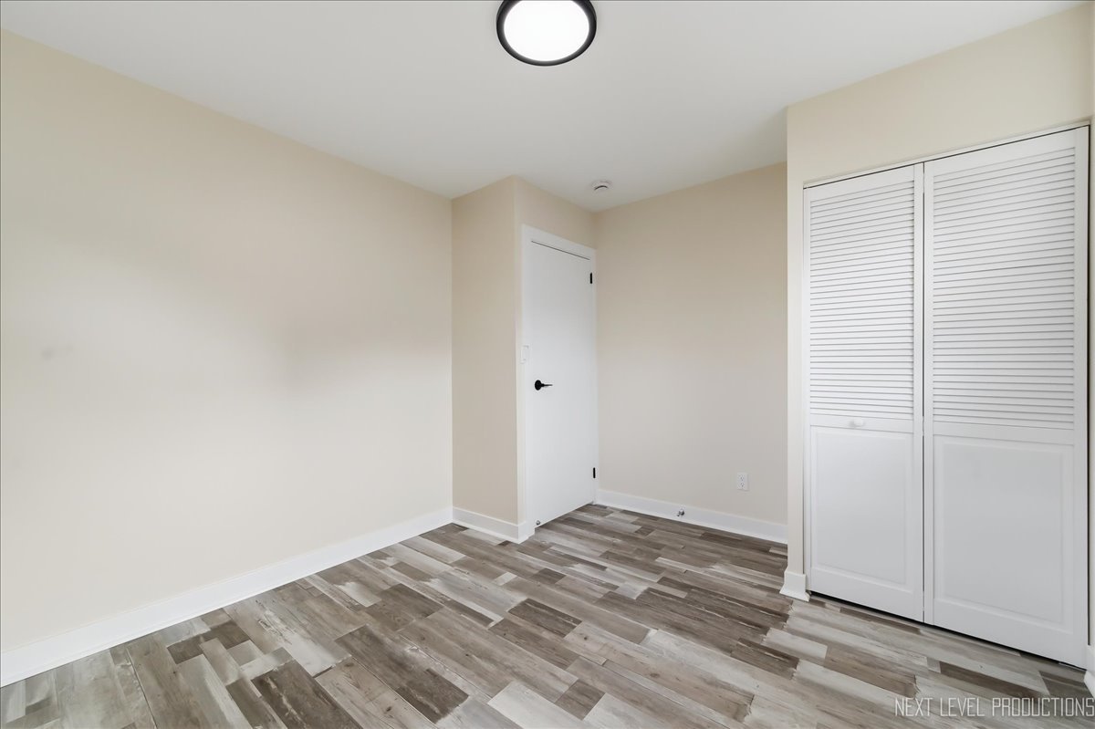 1401 Seminole Drive Ottawa, IL 61350 - Photo 15 of 24 a view of a room with wooden floor