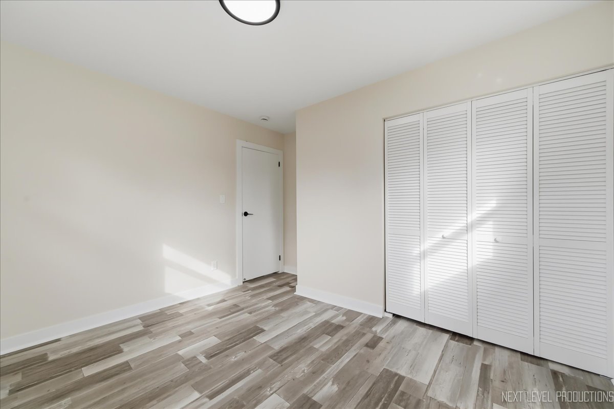 1401 Seminole Drive Ottawa, IL 61350 - Photo 17 of 24 a view of empty room with wooden floor