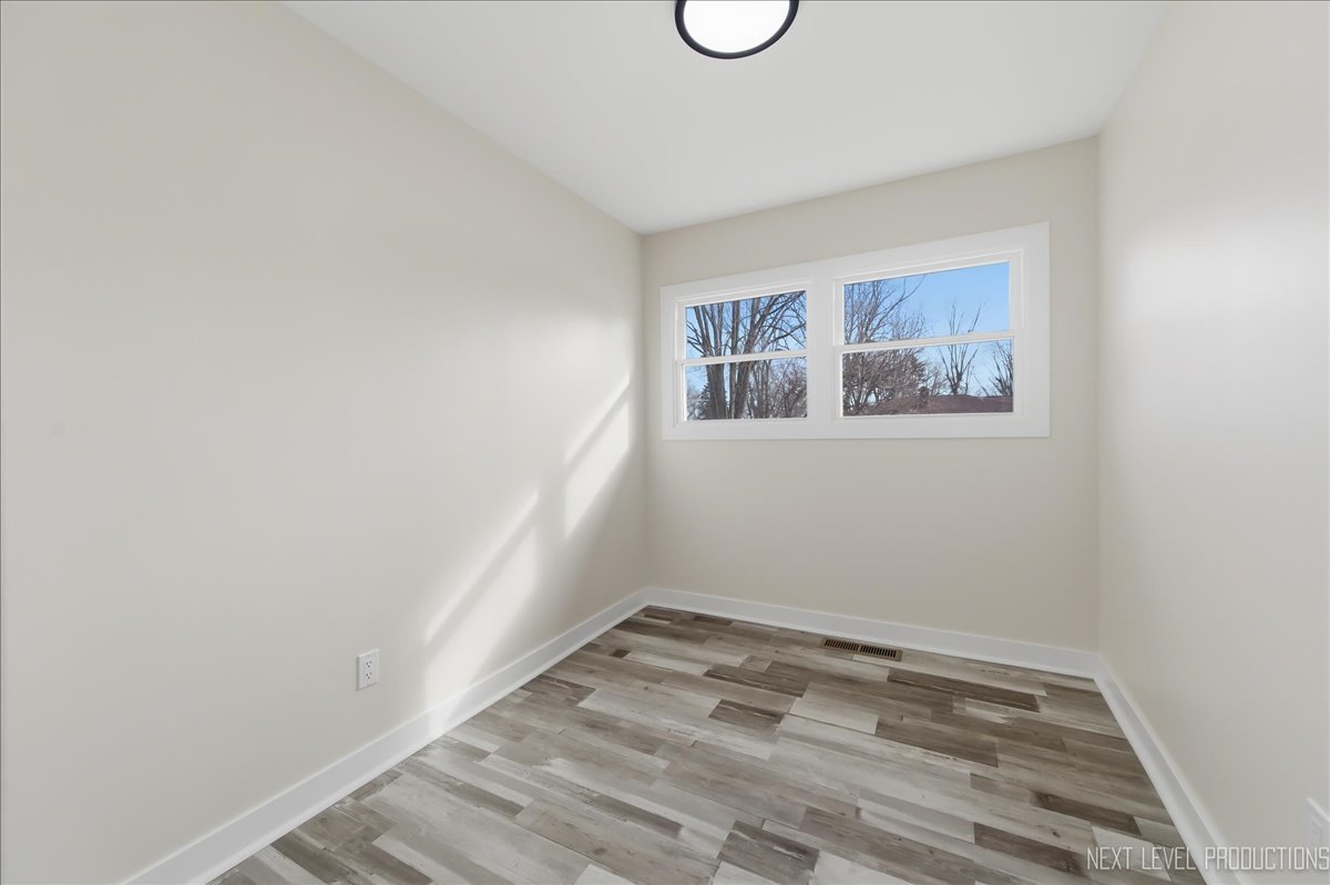 1401 Seminole Drive Ottawa, IL 61350 - Photo 18 of 24 a view of a room with rack on the wall and a window