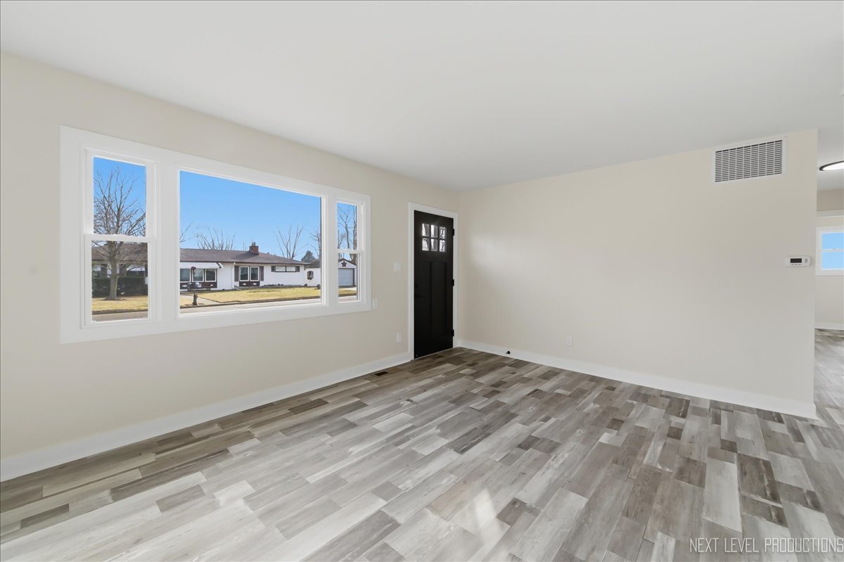 1401 Seminole Drive Ottawa, IL 61350 - Photo 4 of 24 a view of an empty room with a window