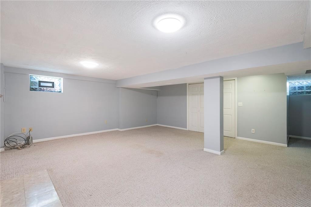 8855 Peebles Road Allison Park, PA 15101 - Photo 17 of 26 an empty room with a empty space and windows