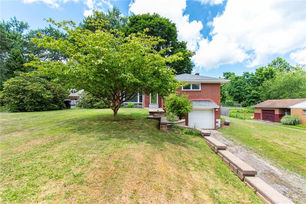 8855 Peebles Road Allison Park, PA 15101 - Photo 19 of 26 a view of a house with a yard