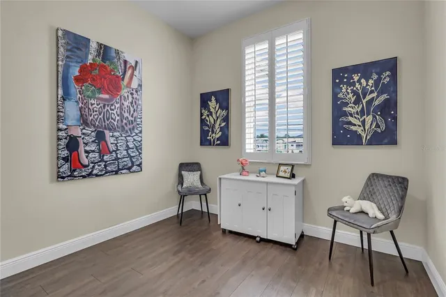 a workspace with furniture and window