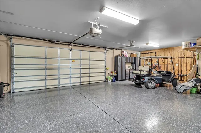 a view of parking garage with cars