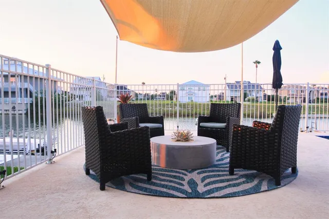 a view of a terrace with chairs
