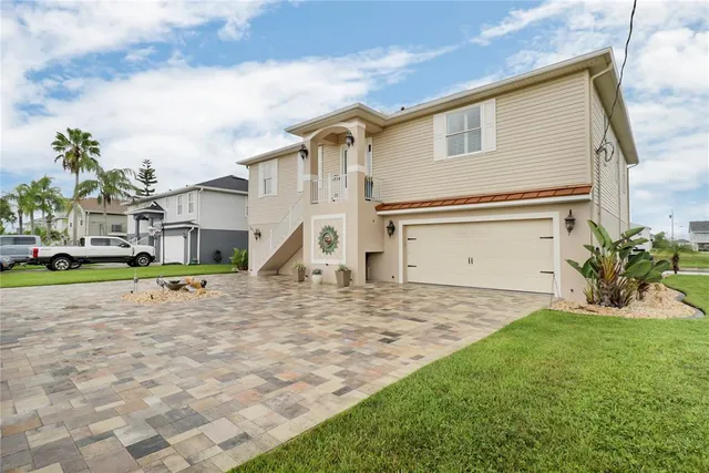 a view of a backyard of the house