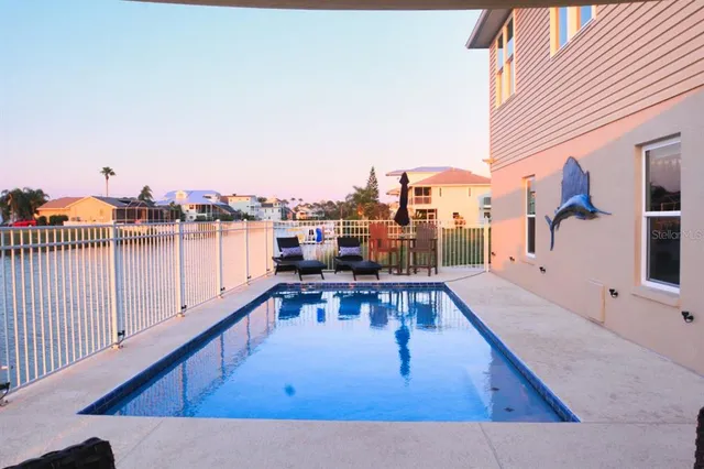 a view of a balcony with chairs