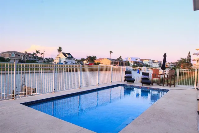 a view of a balcony with staircase
