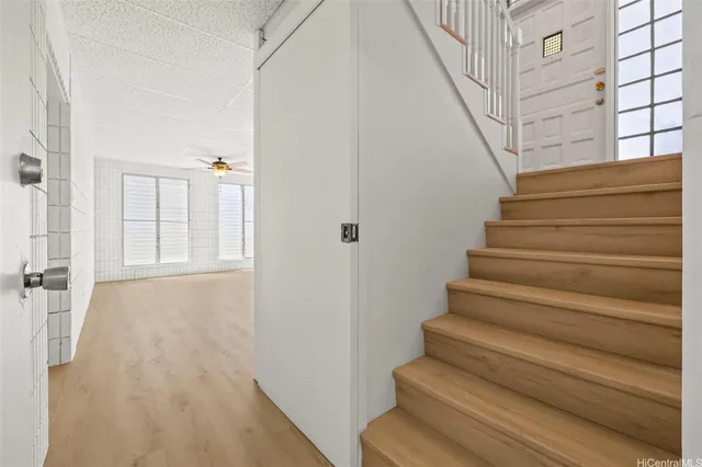 a view of entryway with wooden floor