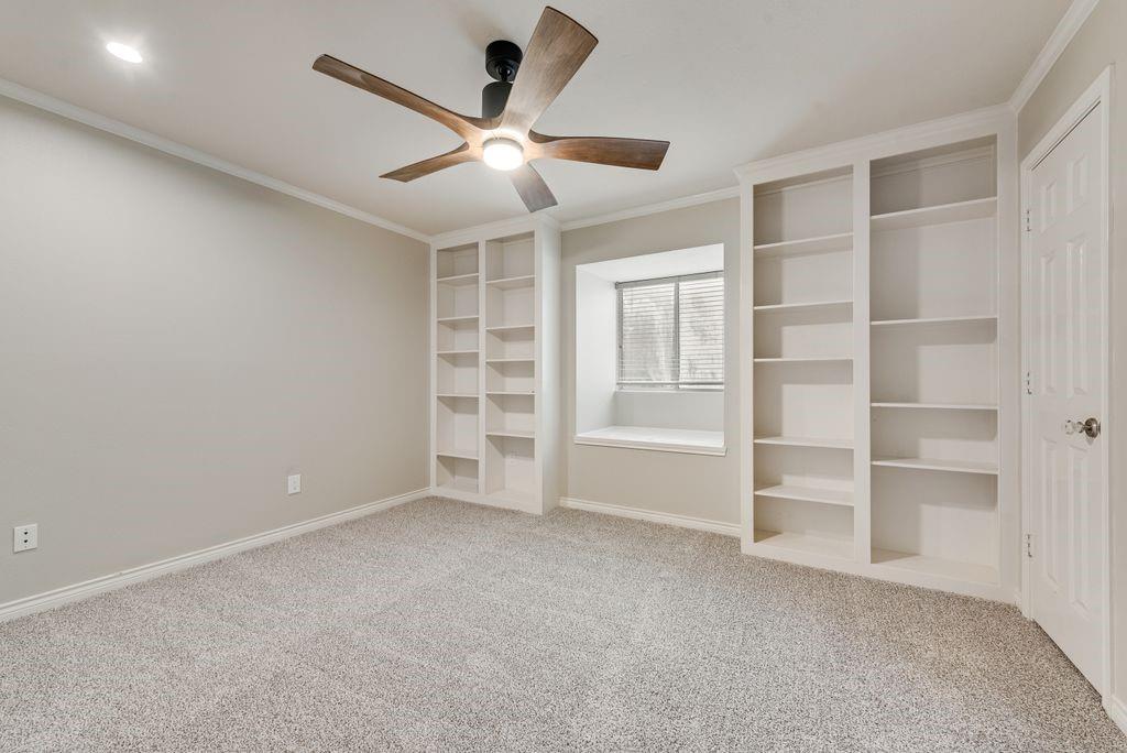 2 Eastshore Road Heath, TX 75032 - Photo 18 of 30 an empty room with closet and windows