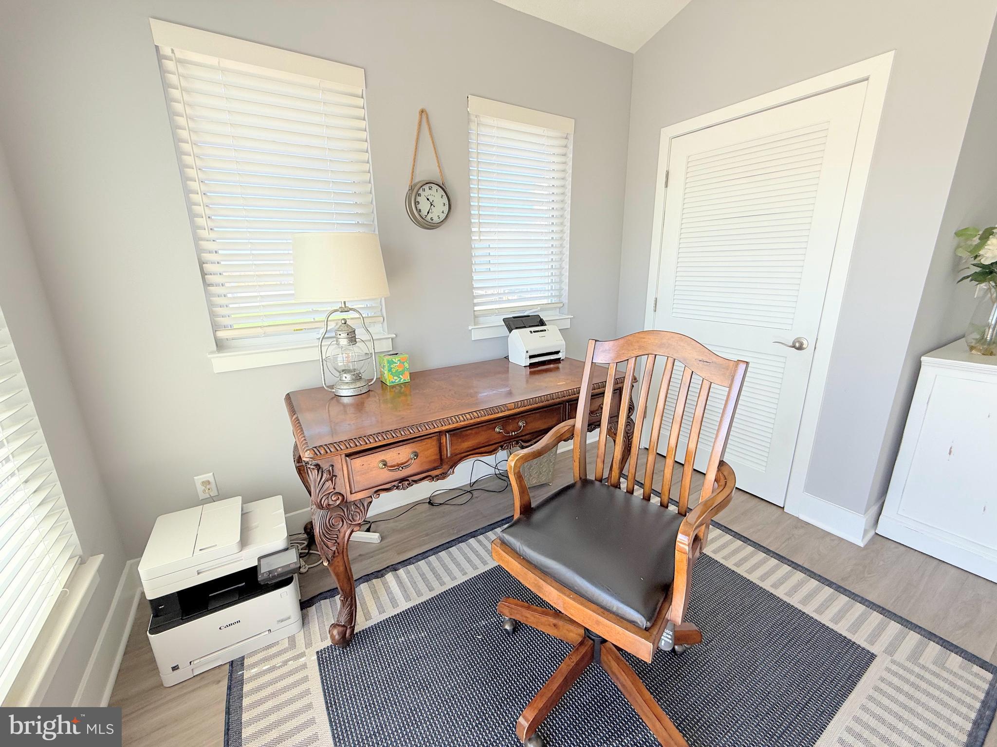 37219 Sandpiper Road, Unit 47 Long Neck, DE 19966 - Photo 22 of 62 a room with chair and a window