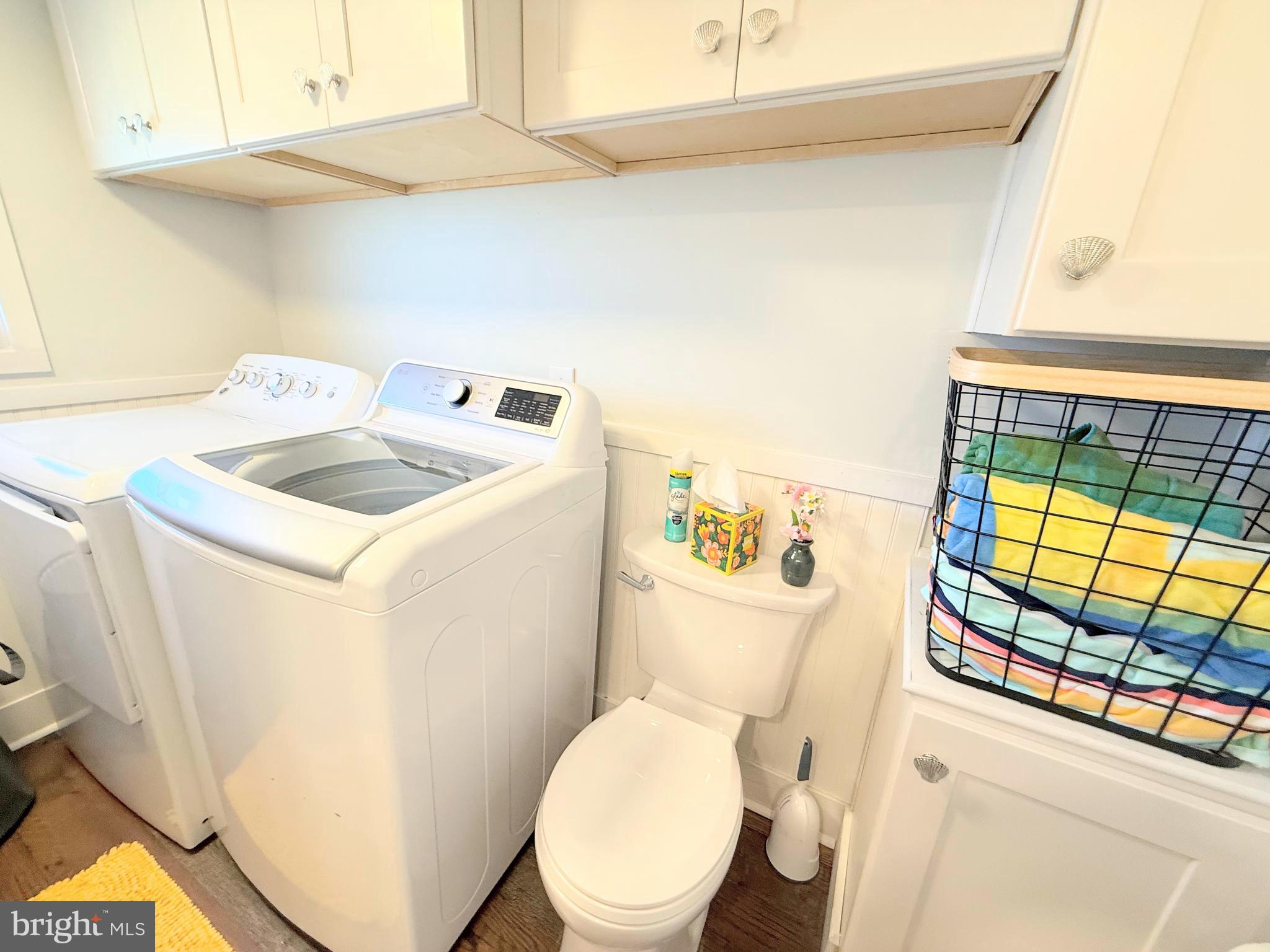37219 Sandpiper Road, Unit 47 Long Neck, DE 19966 - Photo 45 of 62 a utility room with dryer and washer