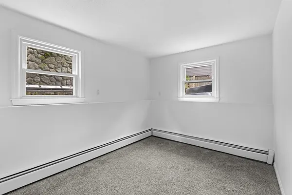an empty room with a workbench