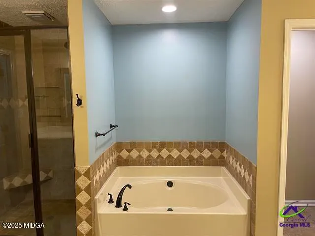 a bathroom with a bathtub