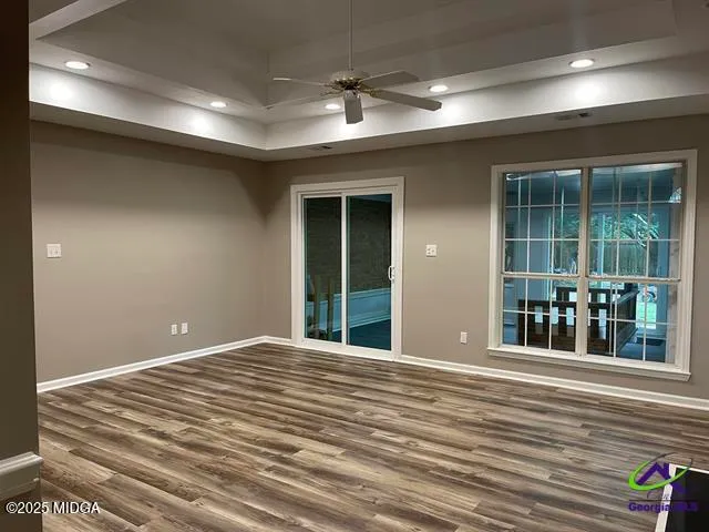 a view of an empty room with a window