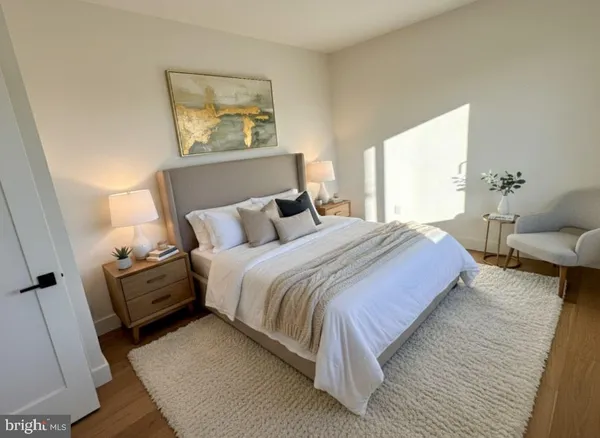 a bedroom with bed and window