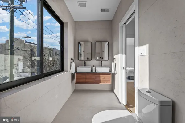 a bathroom with a tub and shower