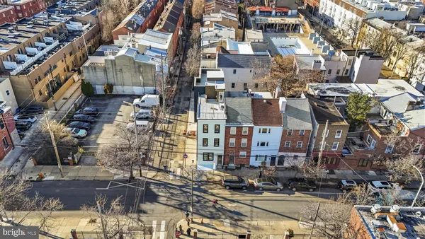 a view of building and front of residential house