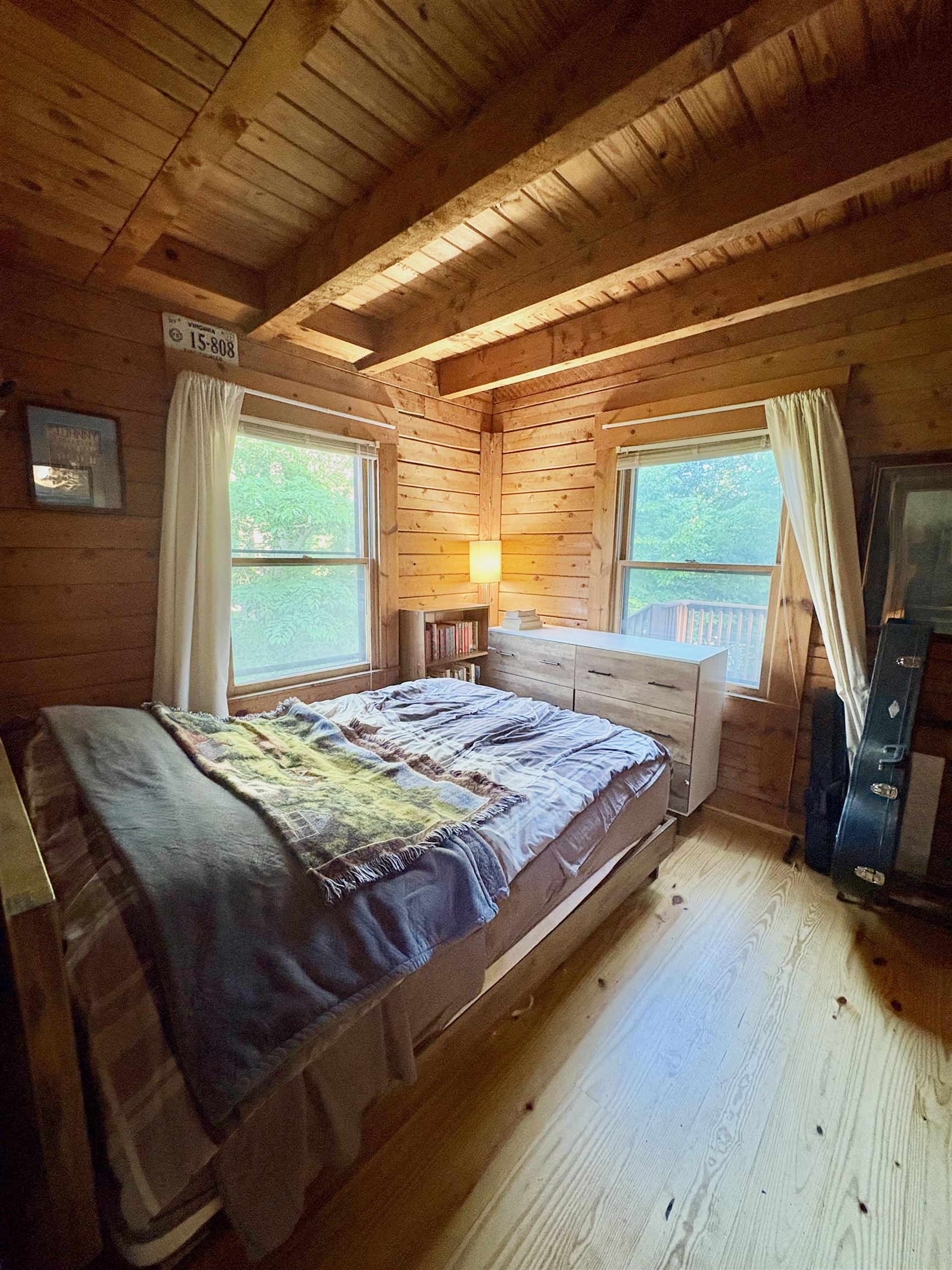79 River Rdg Road Verona, VA 24482 - Photo 29 of 34 a bedroom with a bed and a flat tv screen