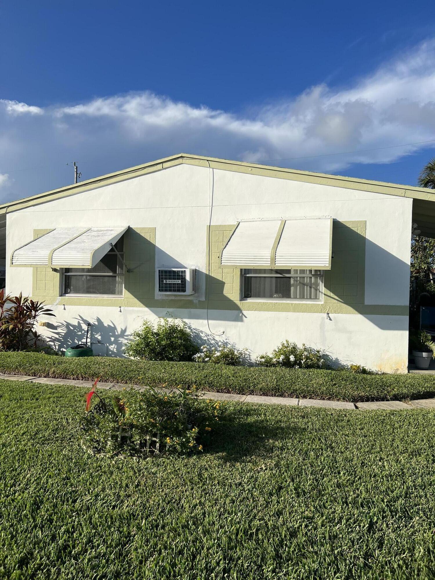 1110 West 2nd Street Riviera Beach, FL 33404 - Photo 1 of 10 Exterior Front