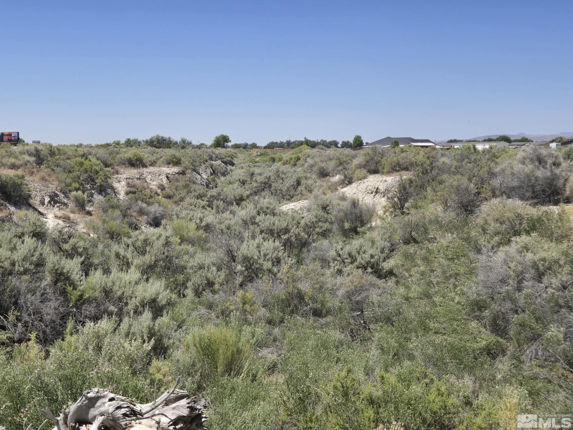 200 Raymond Road Lovelock, NV 89419 - Photo 17 of 18 a view of a city with lush green forest