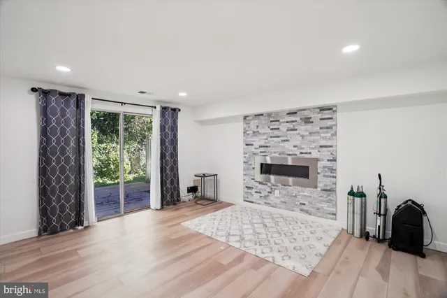 a bedroom with a bed and a television