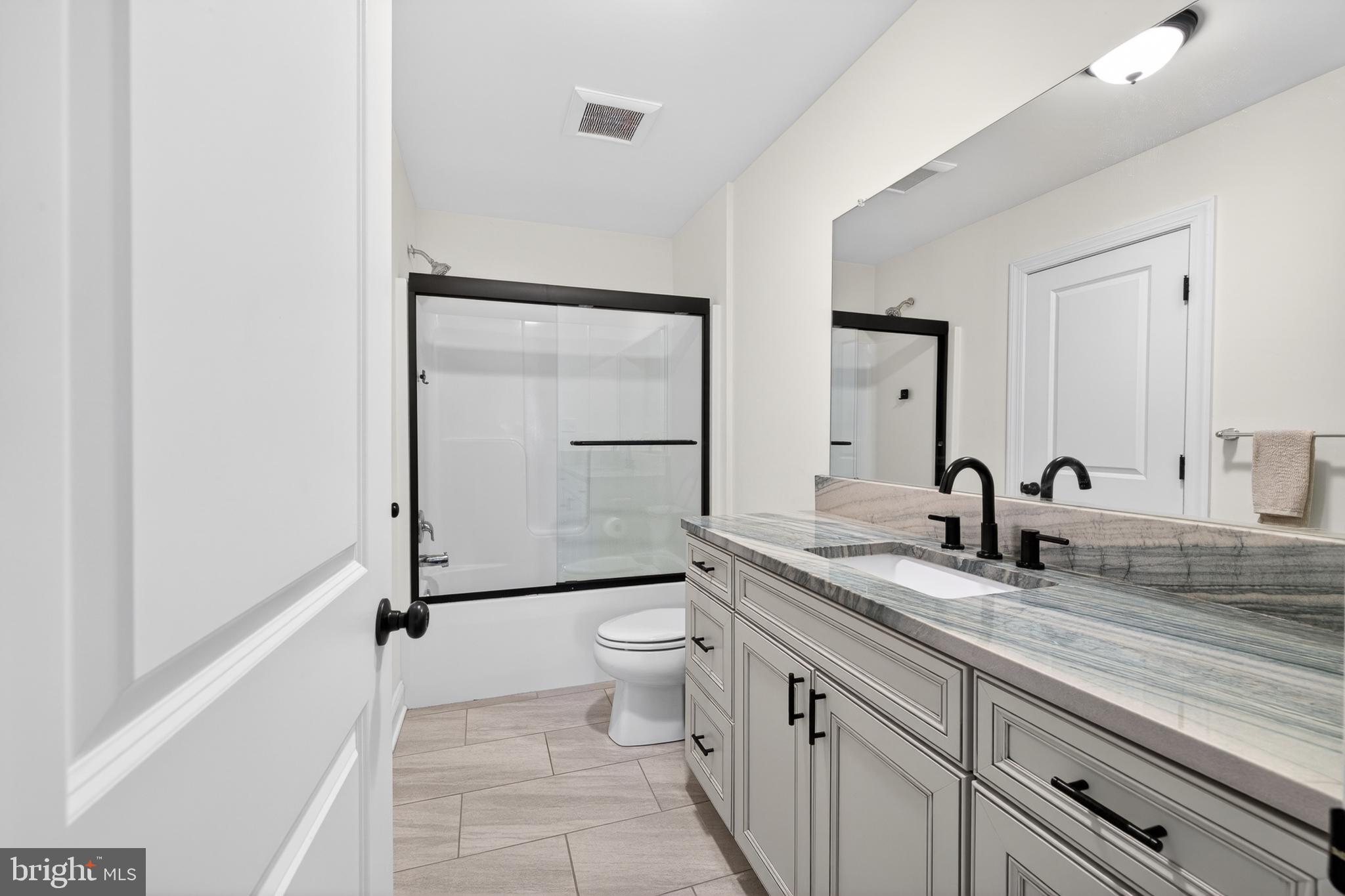 2623 Pike Creek Road Wilmington, DE 19808 - Photo 36 of 66 Modern elegance in a serene bathroom.