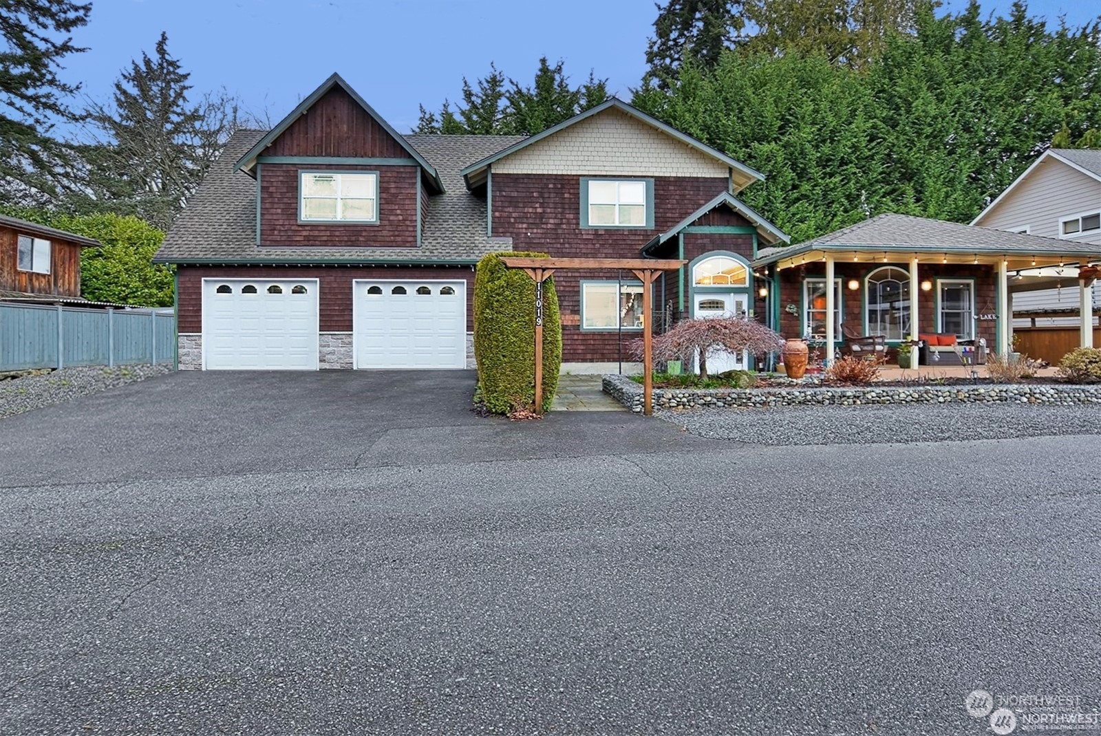 11019 Uct Loop Road Lake Stevens, WA 98258 - Photo 1 of 38 a front view of house with wooden fence