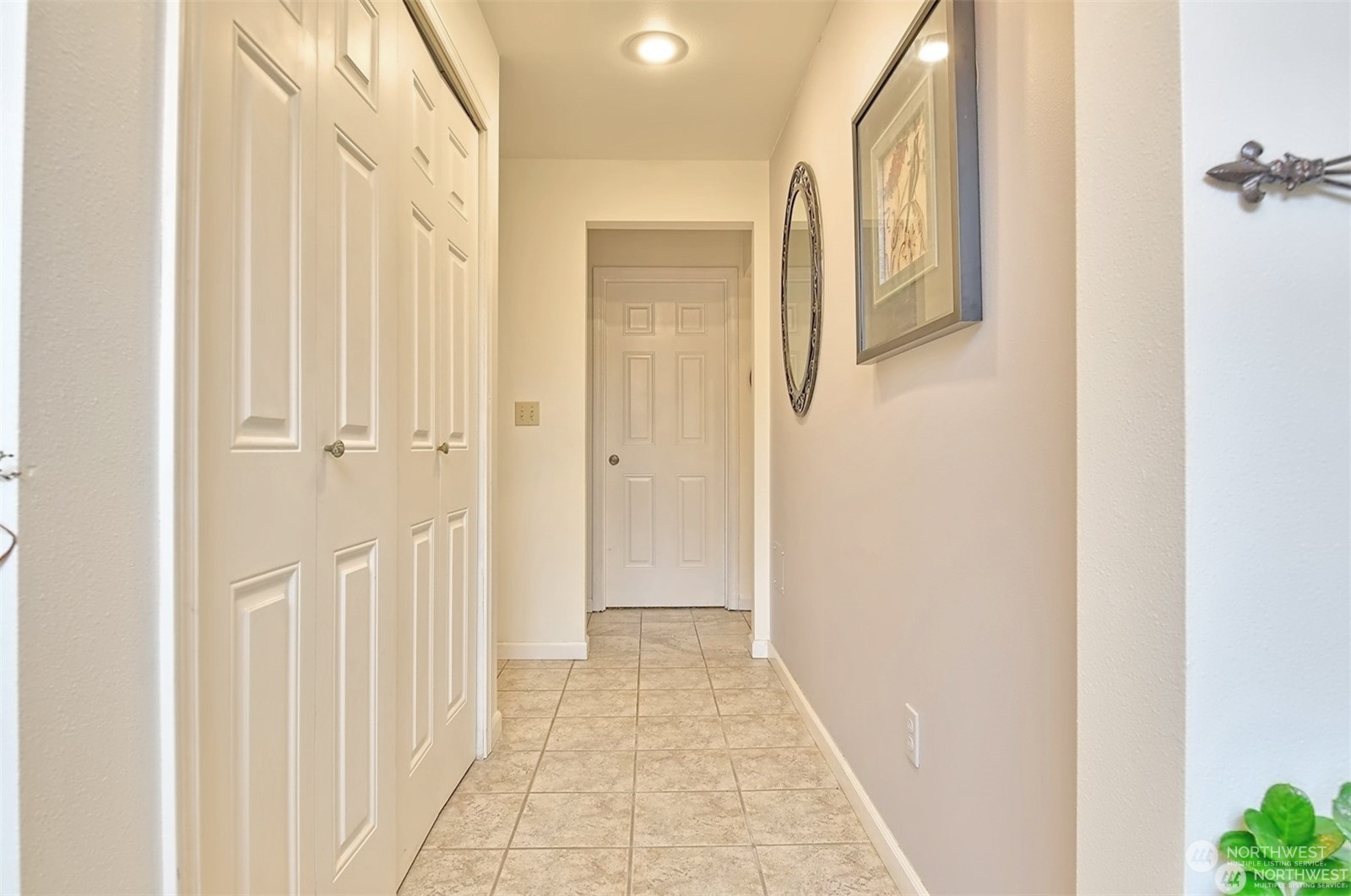 11019 Uct Loop Road Lake Stevens, WA 98258 - Photo 12 of 38 a view of a hallway with wooden floor and staircase