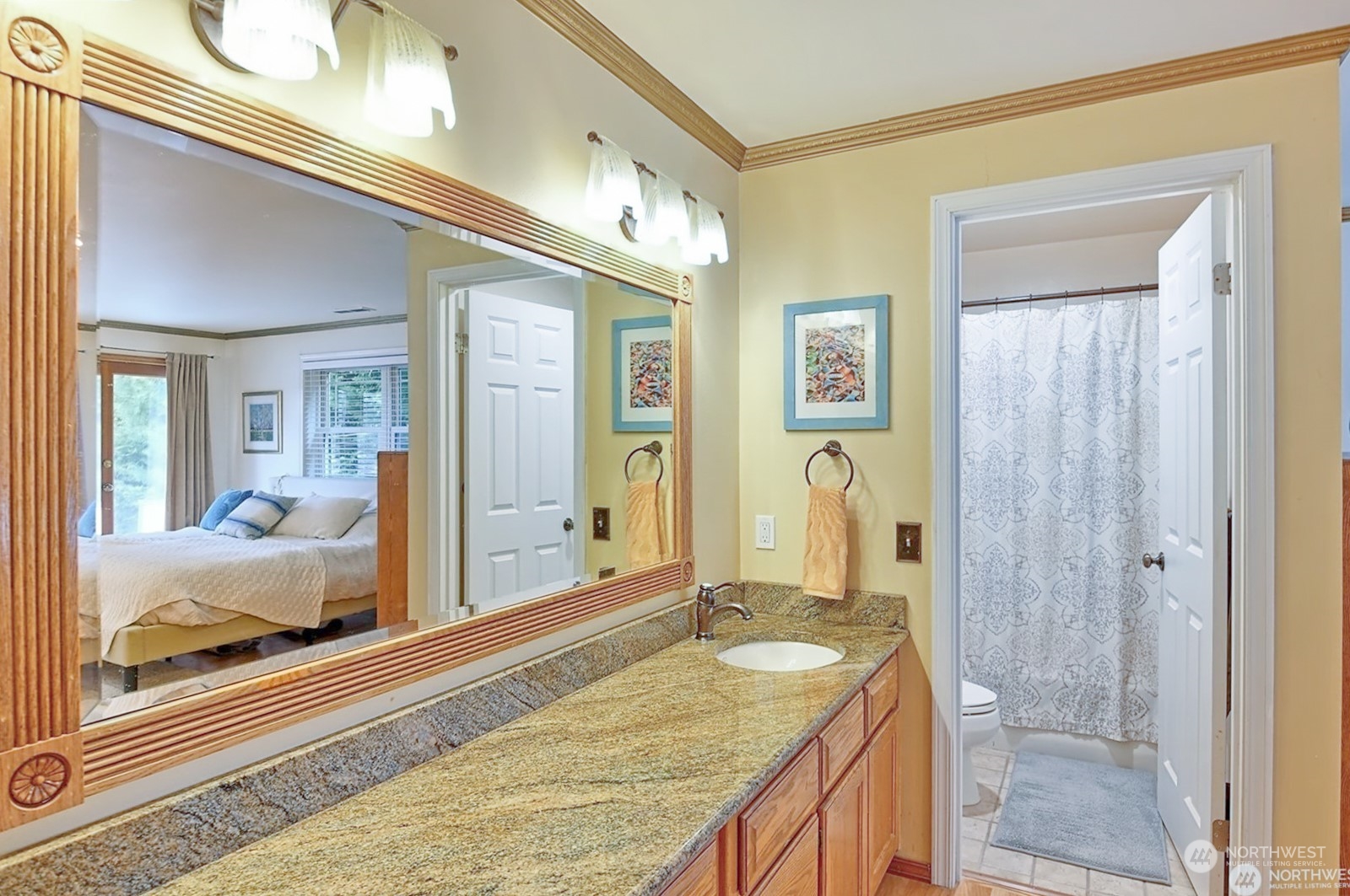 11019 Uct Loop Road Lake Stevens, WA 98258 - Photo 26 of 38 a en suite bathroom with a granite countertop sink and a mirror