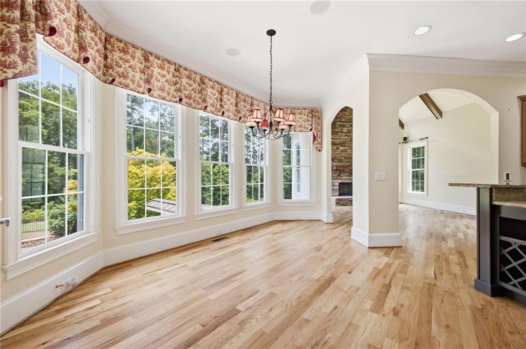 5 St Andrews Way Rome, GA 30165 - Photo 24 of 75 a view of a room with wooden floor and a floor to ceiling window