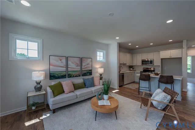 a backyard of a house with plants and barbeque oven