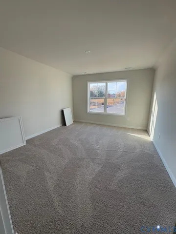 a bathroom with a sink and mirror with toilet