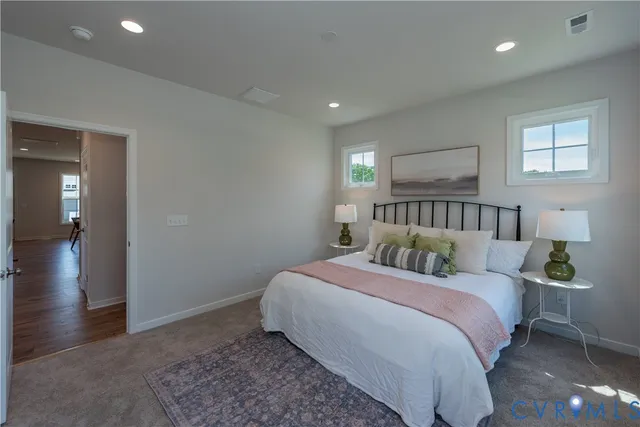 a view of a house with backyard and deck