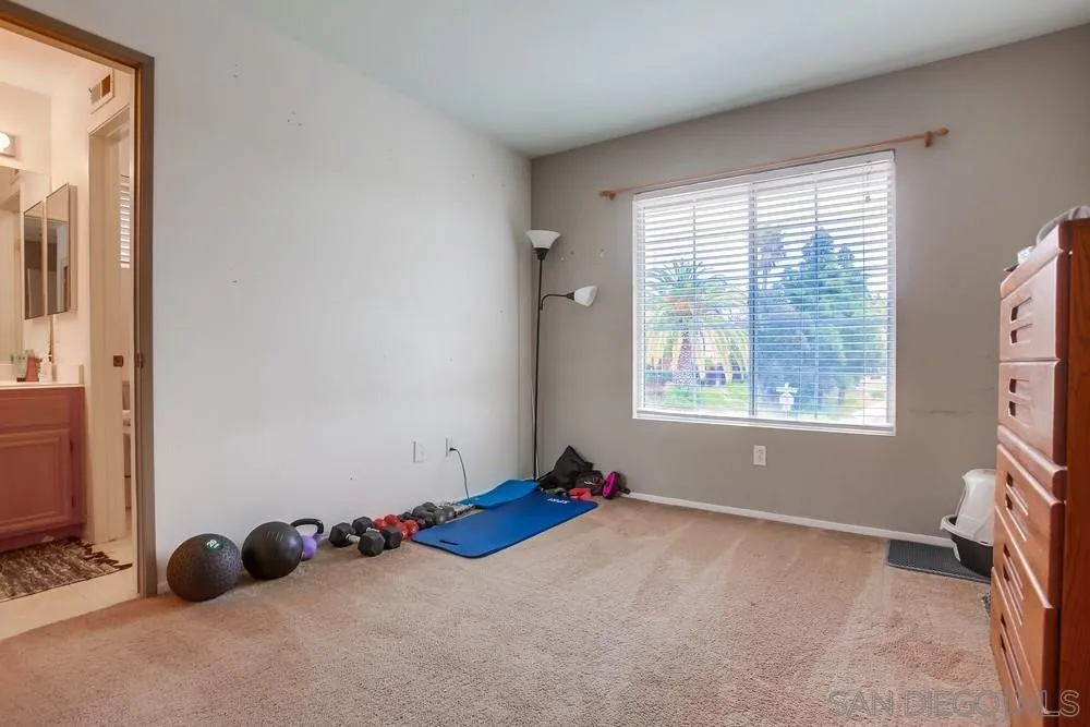 498 Shadow Tree Drive Oceanside, CA 92058 - Photo 35 of 42 wooden floor and window in a room
