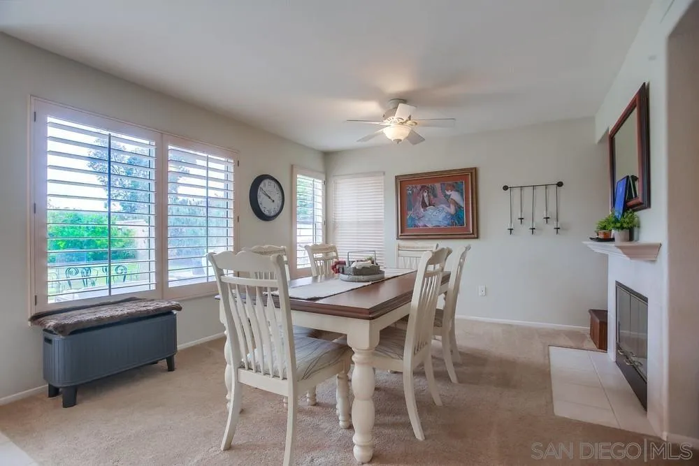 498 Shadow Tree Drive Oceanside, CA 92058 - Photo 8 of 42 a view of a dining room with furniture window and outside view