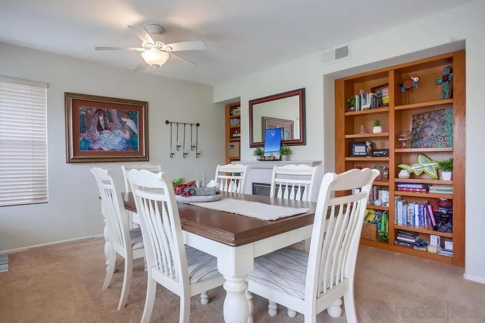 498 Shadow Tree Drive Oceanside, CA 92058 - Photo 9 of 42 a view of a dining room with furniture