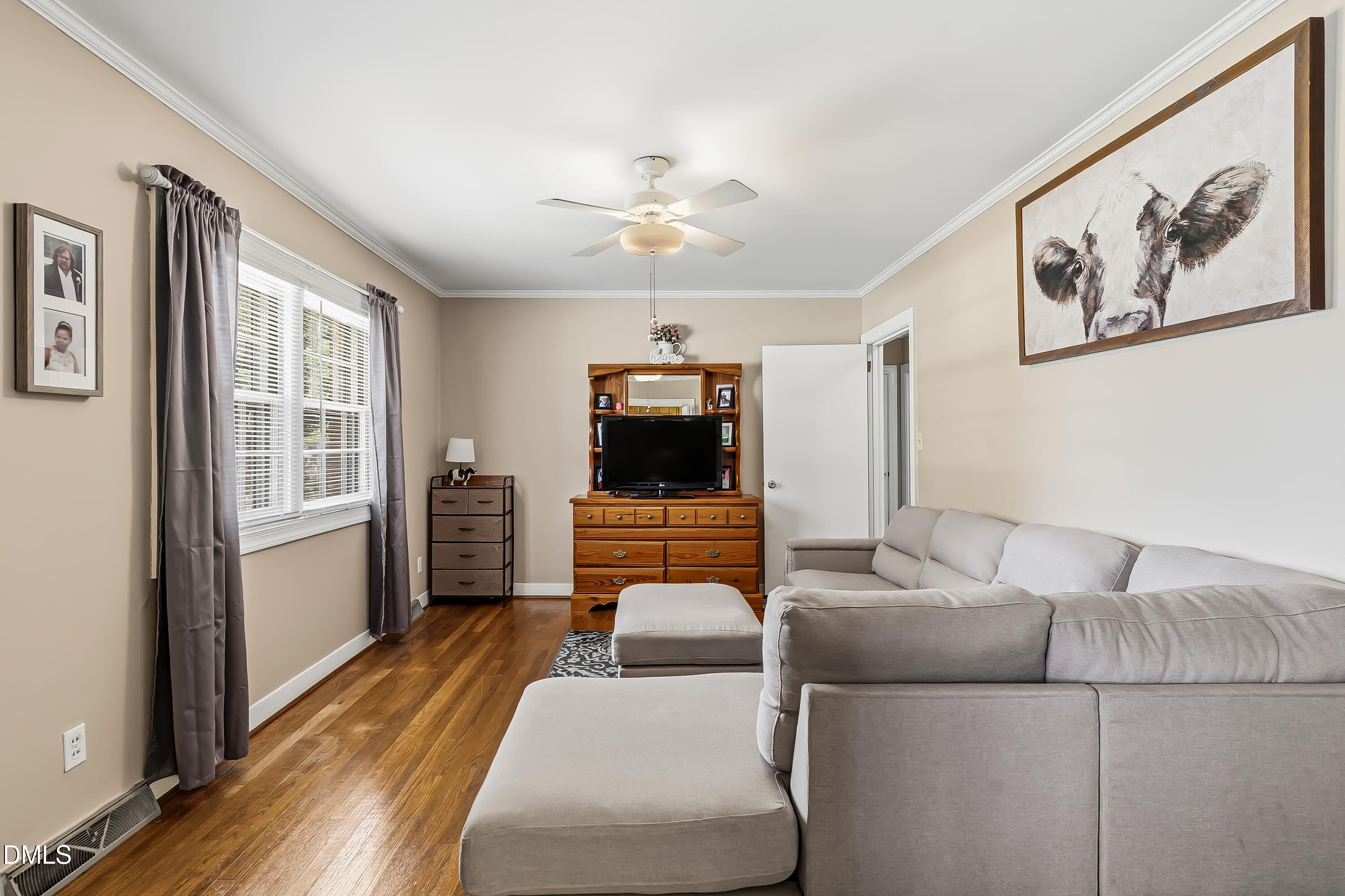 4967 Highway 581 Spring Hope, NC 27882 - Photo 19 of 44 a living room with furniture and a flat screen tv