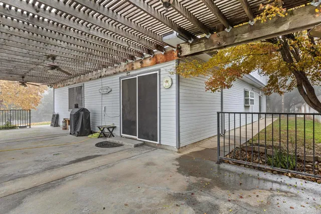 a house with trees in the background