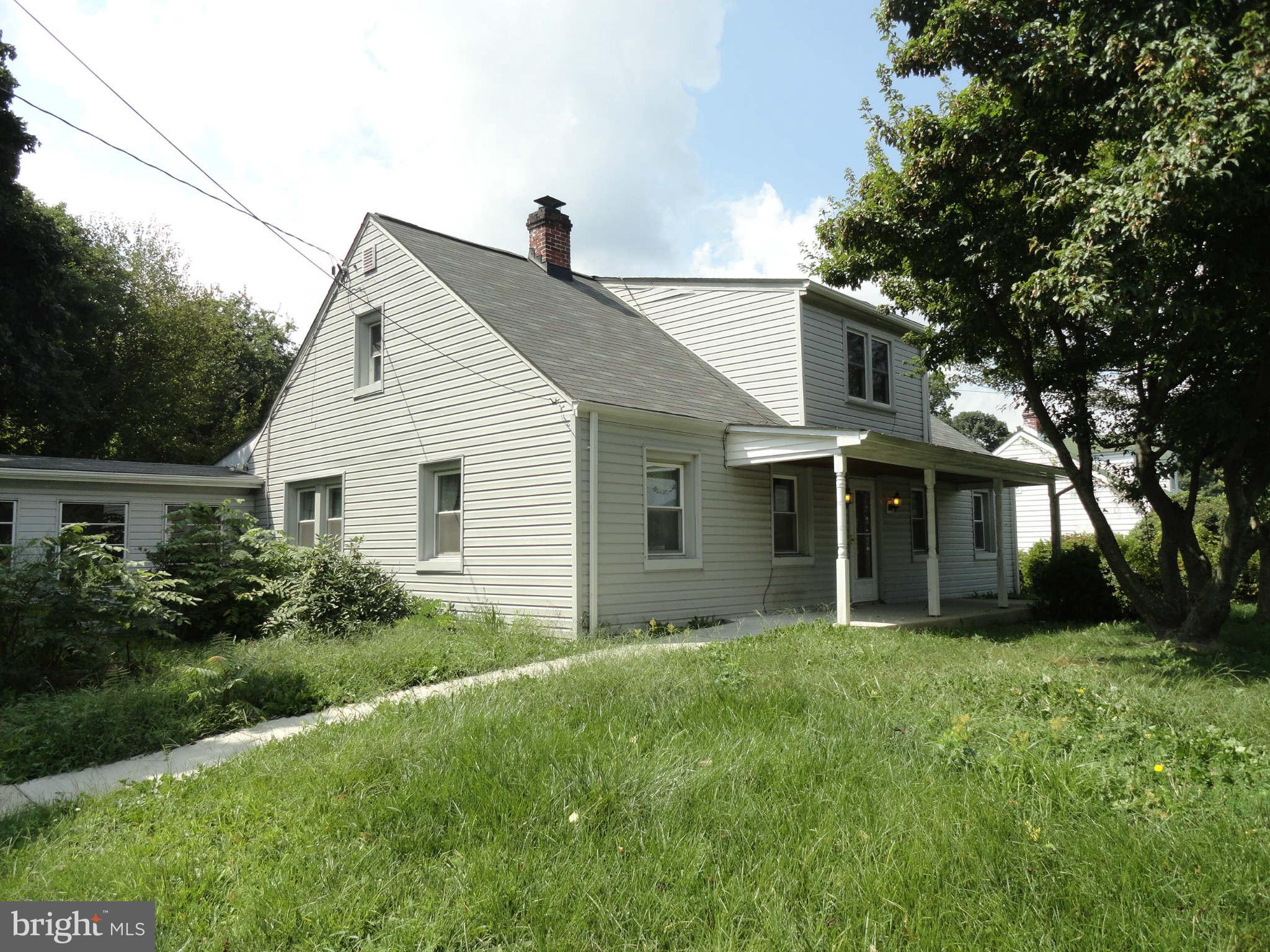 8930 Yellow Springs Road Frederick, MD 21702 - Photo 3 of 21 a view of a house with yard and tree s