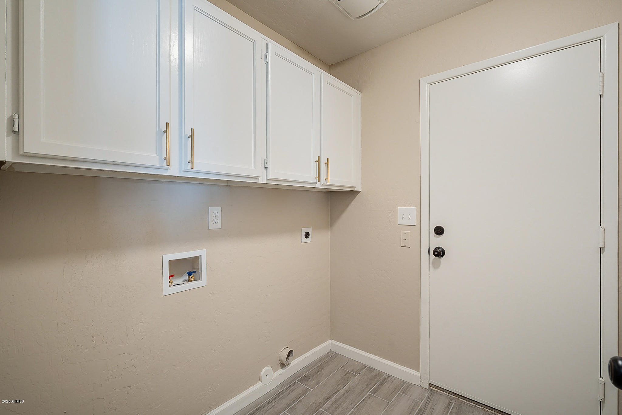 4163 East Pecan Road Phoenix, AZ 85040 - Photo 26 of 32 Inside Laundry