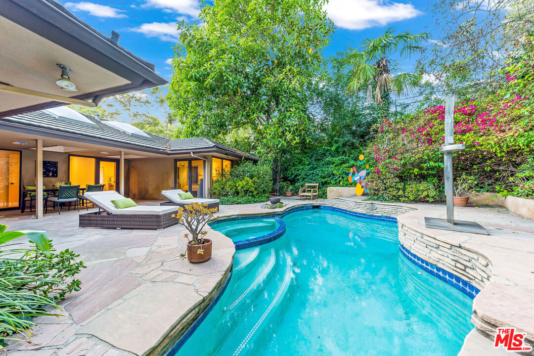 10871 Chalon Road Los Angeles, CA 90077 - Photo 23 of 41 a house view with a sitting space