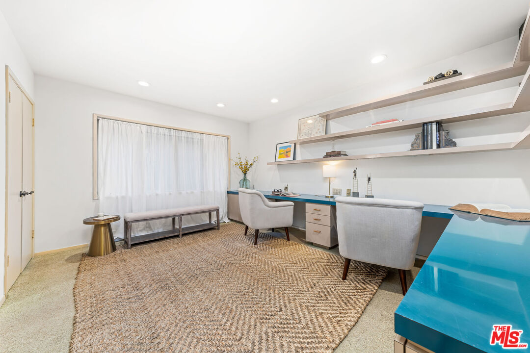 10871 Chalon Road Los Angeles, CA 90077 - Photo 29 of 41 a living room with furniture