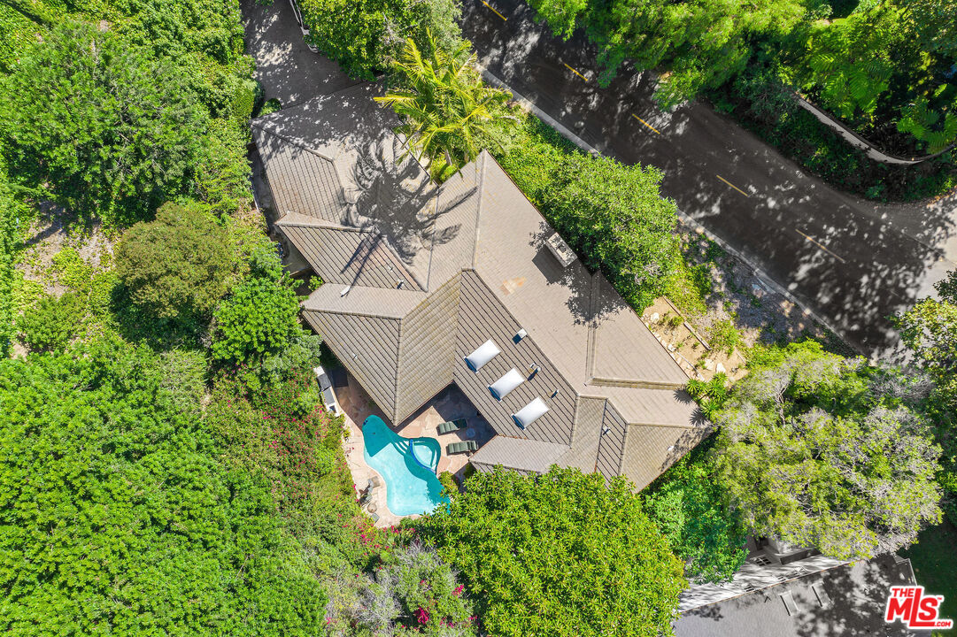 10871 Chalon Road Los Angeles, CA 90077 - Photo 4 of 41 an aerial view of a house with yard