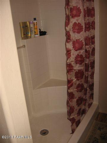 543 West Ahonen Road Paulden, AZ 86334 - Photo 12 of 24 a bathroom with a shower