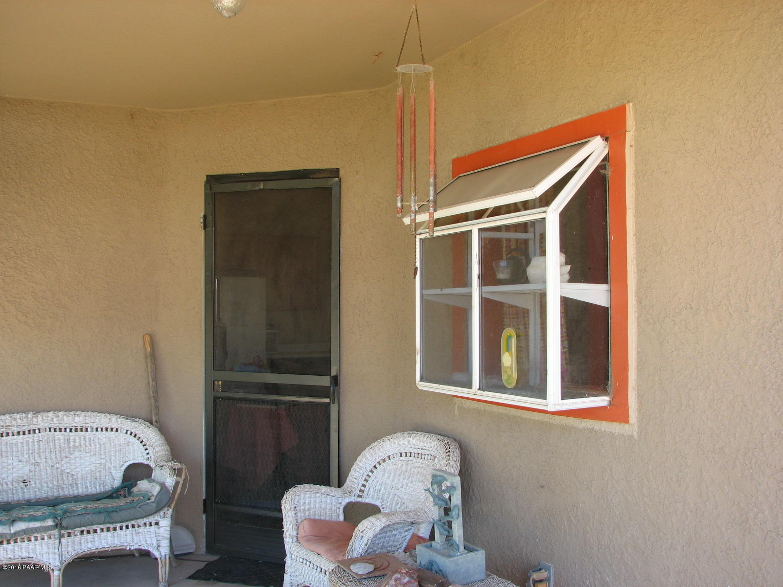 543 West Ahonen Road Paulden, AZ 86334 - Photo 19 of 24 a bedroom with a bed and a window