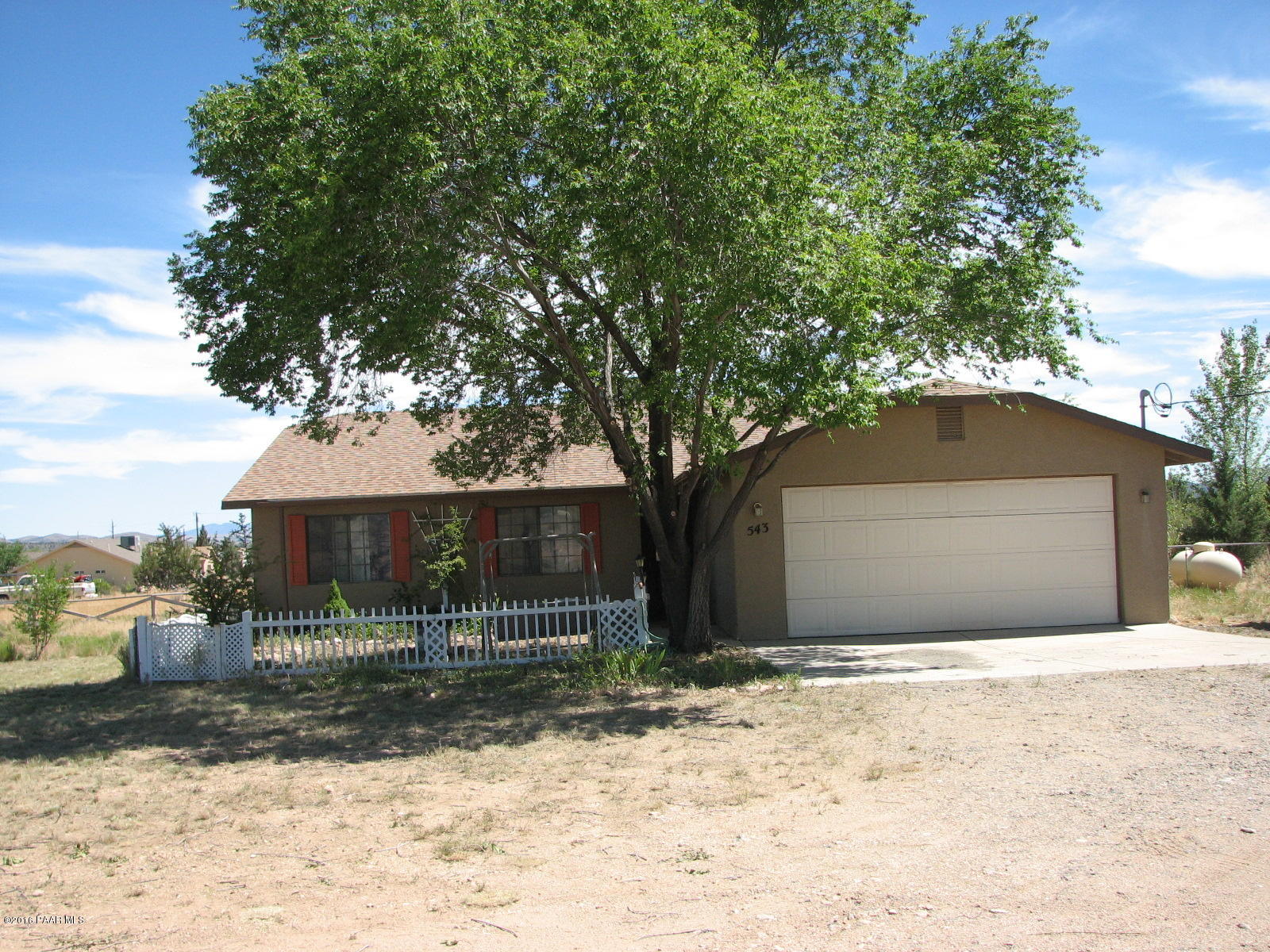 543 West Ahonen Road Paulden, AZ 86334 - Photo 2 of 24 a front view of a house with a yard