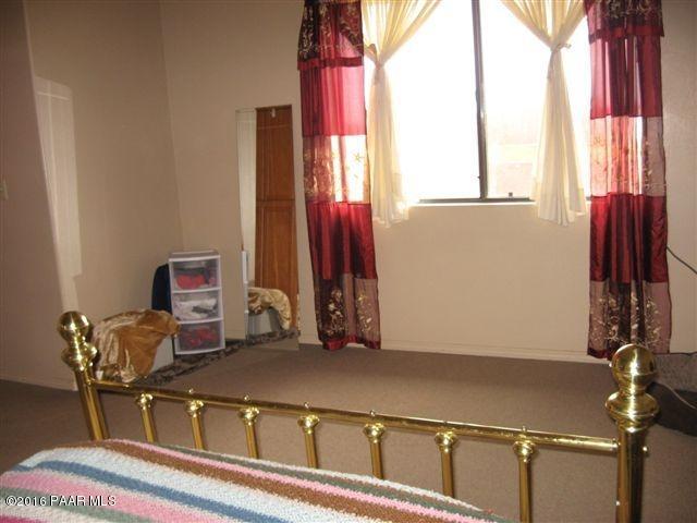 543 West Ahonen Road Paulden, AZ 86334 - Photo 7 of 24 a room with a window and a mirror